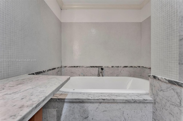 6101 Aqua Ave Unit 103, Miami Beach, FL 33141 - bathroom with a bath and ornamental molding