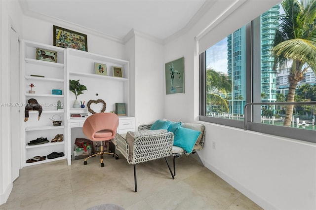 sitting room with crown molding