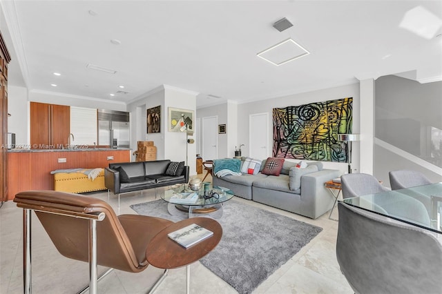 living room featuring ornamental molding and recessed lighting