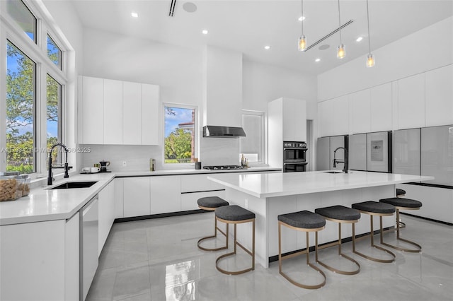 7900 SW 70th St, Miami, FL 33143 - kitchen with a towering ceiling, modern cabinets, backsplash, white cabinetry, and recessed lighting
