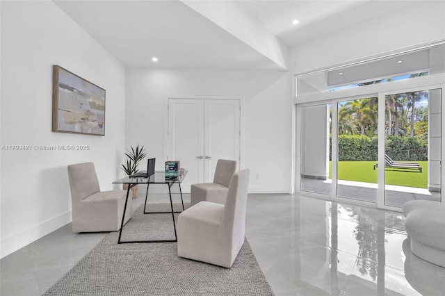 7900 SW 70th St, Miami, FL 33143 - living area with recessed lighting and tile patterned flooring