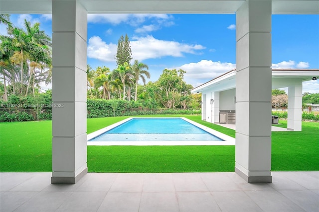 7900 SW 70th St, Miami, FL 33143 - view of pool featuring a patio area and a yard