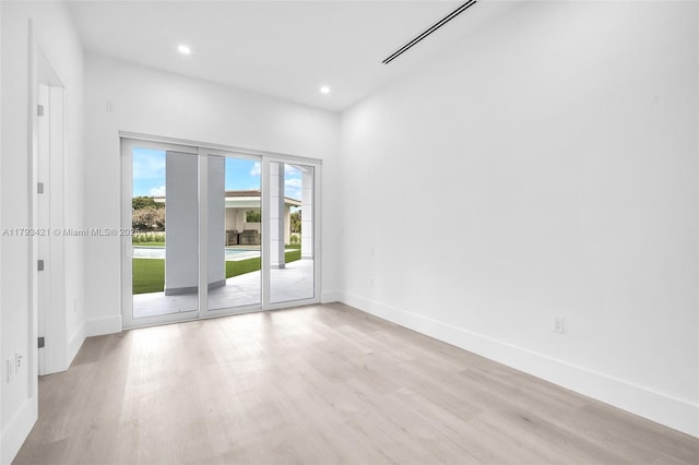 7900 SW 70th St, Miami, FL 33143 - unfurnished room featuring light wood-type flooring and recessed lighting