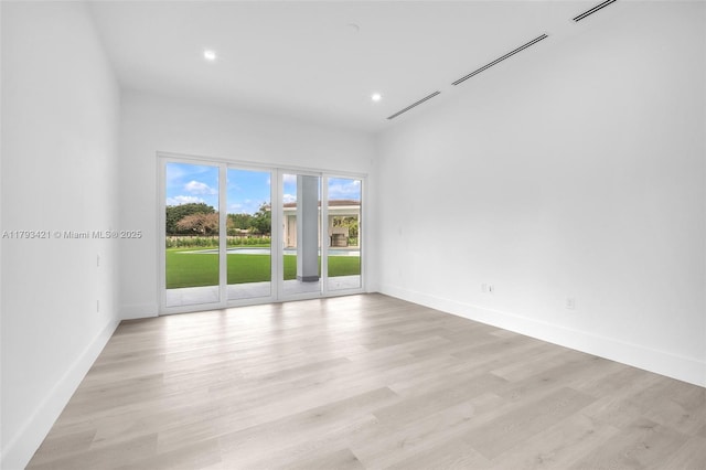 7900 SW 70th St, Miami, FL 33143 - empty room with light wood-type flooring and recessed lighting