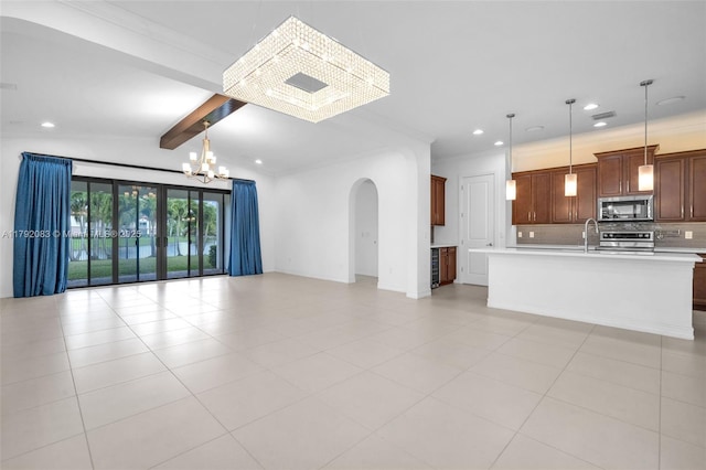 unfurnished living room featuring recessed lighting, arched walkways, lofted ceiling with beams, and a notable chandelier