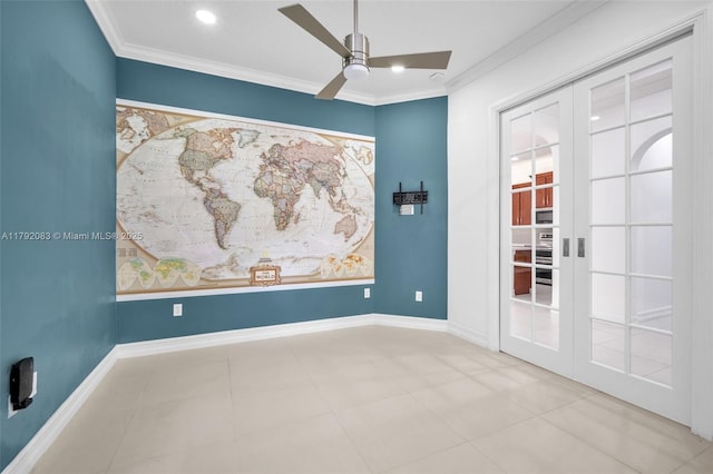 unfurnished room with baseboards, ornamental molding, and a ceiling fan