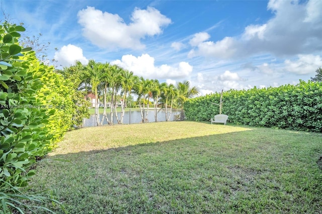 view of yard with a water view