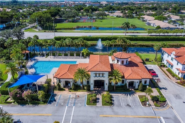 birds eye view of property featuring a water view