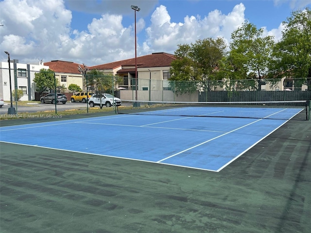 460 W Park Dr Unit 103, Miami, FL 33172 - view of tennis court featuring fence