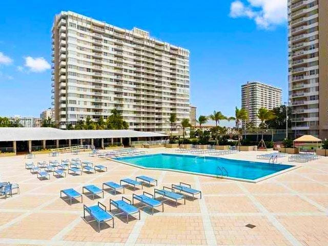 1950 S Ocean Dr Unit 3K, Hallandale Beach, FL 33009 - community pool featuring a patio area