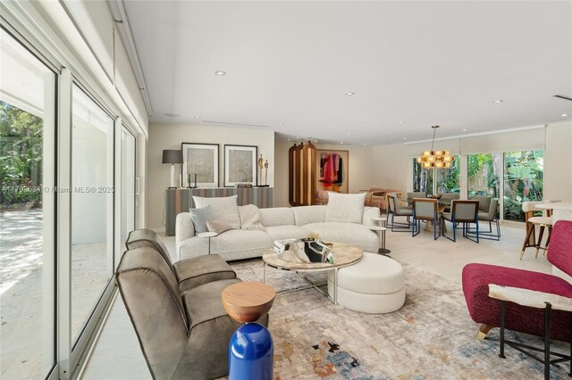 1075 NE 99th St, Miami Shores, FL 33138 - living area featuring healthy amount of natural light, a chandelier, and recessed lighting