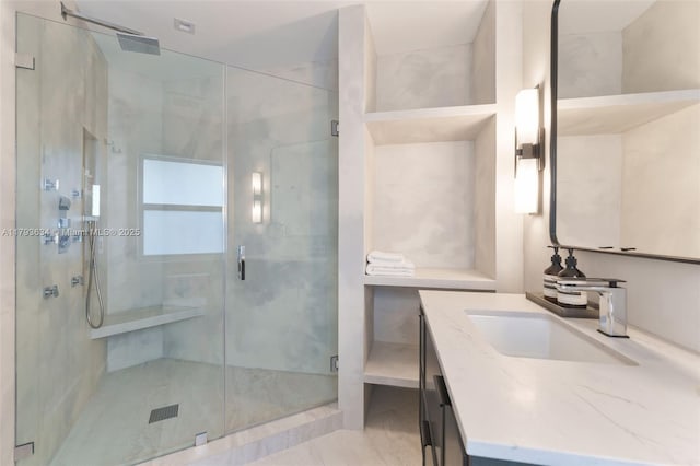 full bath featuring vanity and a stall shower