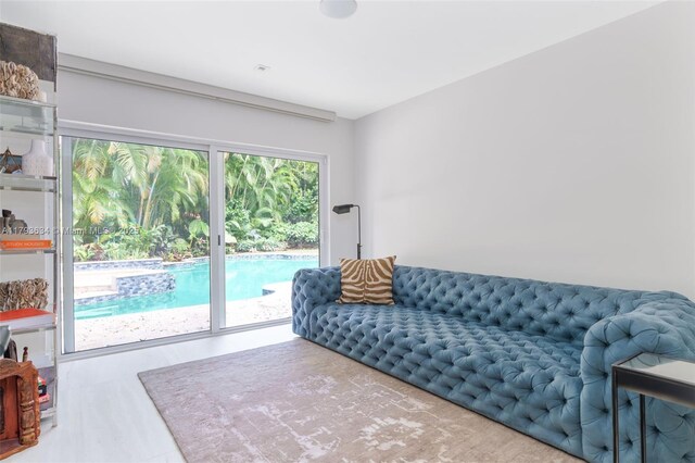 1075 NE 99th St, Miami Shores, FL 33138 - living room featuring wood finished floors