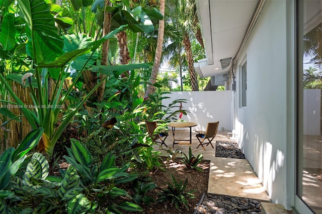 view of yard featuring a patio and fence