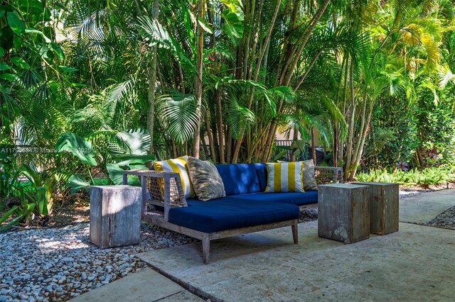 1075 NE 99th St, Miami Shores, FL 33138 - view of patio / terrace with outdoor lounge area