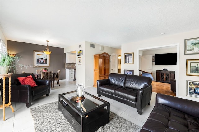 10761 SW 113th Pl Unit 102D, Miami, FL 33176 - living area with light tile patterned floors and visible vents