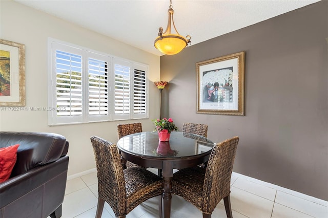 10761 SW 113th Pl Unit 102D, Miami, FL 33176 - dining area featuring baseboards and light tile patterned floors