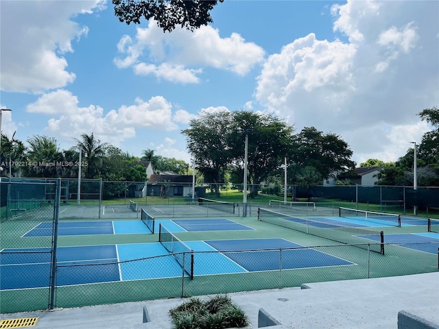 10761 SW 113th Pl Unit 102D, Miami, FL 33176 - view of tennis court with fence and community basketball court