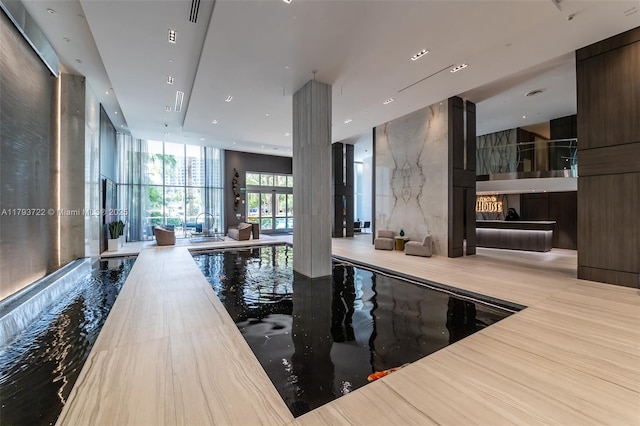 333 Las Olas Way Unit 2401, Fort Lauderdale, FL 33301 - dock area featuring an indoor pool