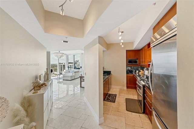 333 Las Olas Way Unit 2401, Fort Lauderdale, FL 33301 - hallway featuring visible vents and an inviting chandelier