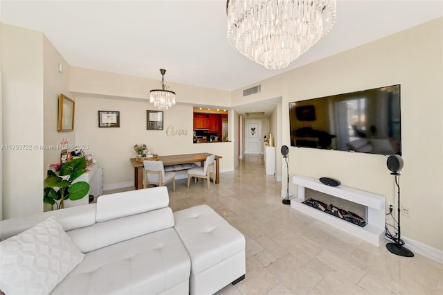 333 Las Olas Way Unit 2401, Fort Lauderdale, FL 33301 - living area with an inviting chandelier, baseboards, and visible vents