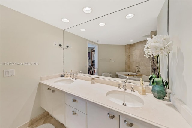 333 Las Olas Way Unit 2401, Fort Lauderdale, FL 33301 - full bathroom with a sink, recessed lighting, a bathtub, and double vanity
