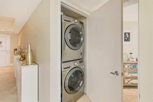 333 Las Olas Way Unit 2401, Fort Lauderdale, FL 33301 - laundry area with laundry area and stacked washing maching and dryer