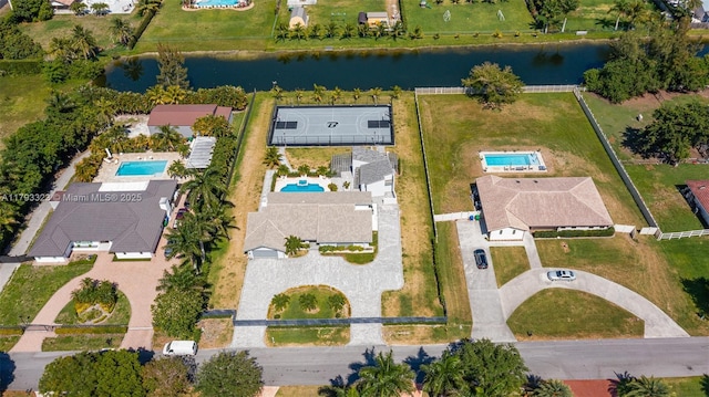 3401 SW 141st Ave, Miramar, FL 33027 - drone / aerial view of a nearby body of water and a pool area