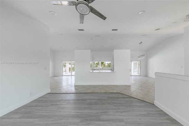 3401 SW 141st Ave, Miramar, FL 33027 - unfurnished living room with ceiling fan, light tile patterned flooring, baseboards, and recessed lighting