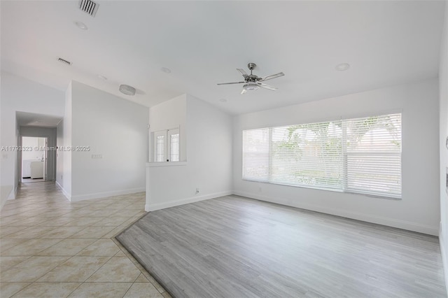 3401 SW 141st Ave, Miramar, FL 33027 - empty room with vaulted ceiling, ceiling fan, baseboards, and light tile patterned floors