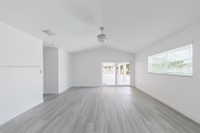 3401 SW 141st Ave, Miramar, FL 33027 - unfurnished room featuring light wood-type flooring, vaulted ceiling, and baseboards