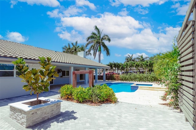 3401 SW 141st Ave, Miramar, FL 33027 - swimming pool featuring an outdoor fire pit and a patio