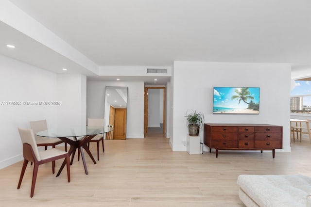 dining area with visible vents, recessed lighting, light wood-style flooring, and baseboards