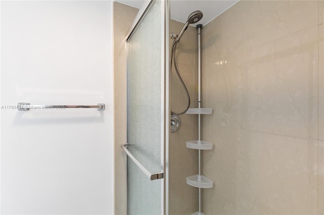 bathroom with an enclosed shower