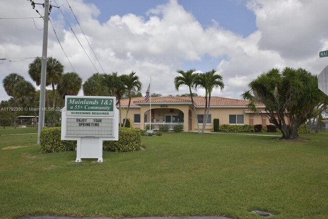 4701 NW 43rd Ave, Tamarac, FL 33319 - exterior space featuring a lawn