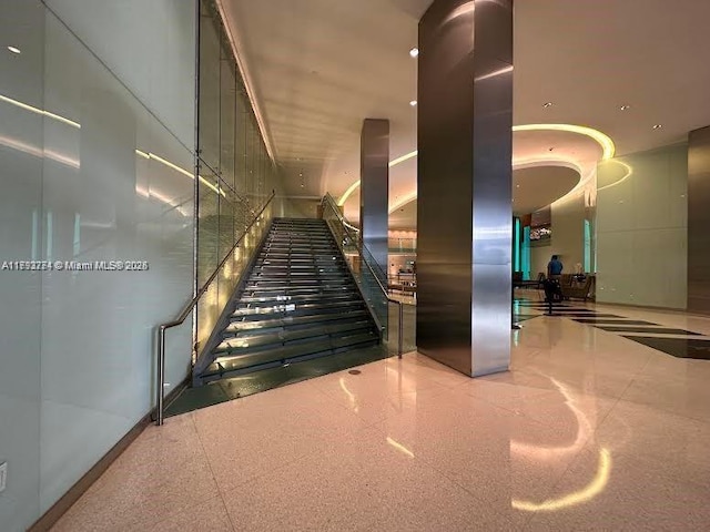 stairs with a high ceiling