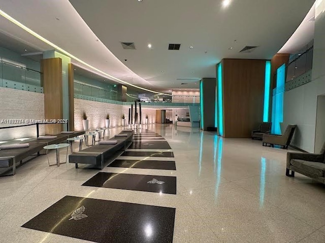 building lobby featuring visible vents