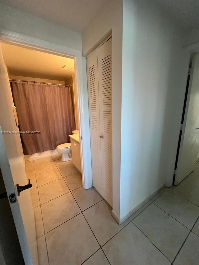interior space featuring light tile patterned floors