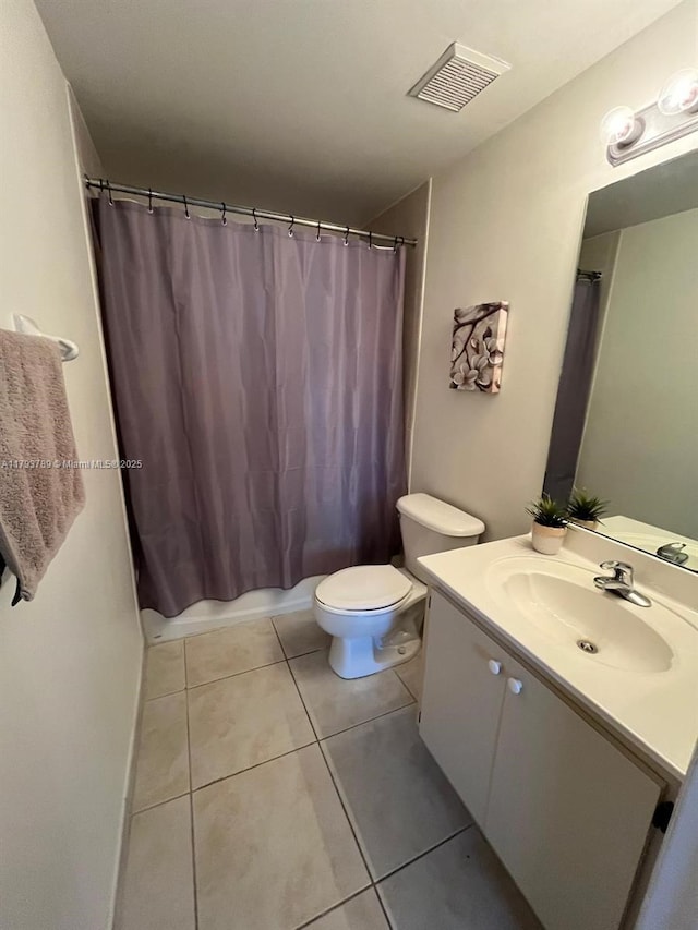 bathroom with visible vents, tile patterned floors, vanity, toilet, and a shower with shower curtain