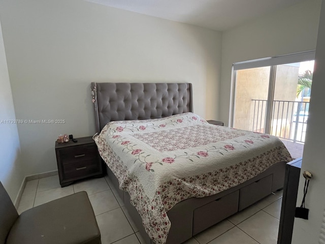 bedroom featuring access to outside and light tile patterned flooring