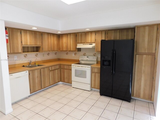 8005 SW 107th Ave Unit 118, Miami, FL 33173 - kitchen with a sink, white appliances, light countertops, recessed lighting, and under cabinet range hood