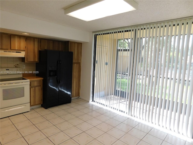 8005 SW 107th Ave Unit 118, Miami, FL 33173 - kitchen featuring black fridge with ice dispenser, brown cabinetry, under cabinet range hood, white range with electric stovetop, and backsplash