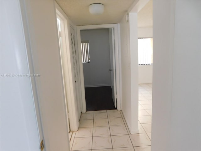 8005 SW 107th Ave Unit 118, Miami, FL 33173 - hallway featuring light tile patterned floors
