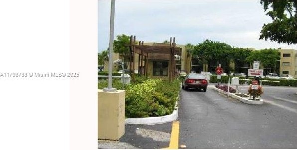 8005 SW 107th Ave Unit 118, Miami, FL 33173 - view of street featuring traffic signs and curbs