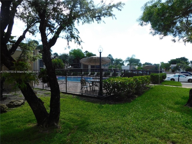 8005 SW 107th Ave Unit 118, Miami, FL 33173 - community pool featuring a yard and fence