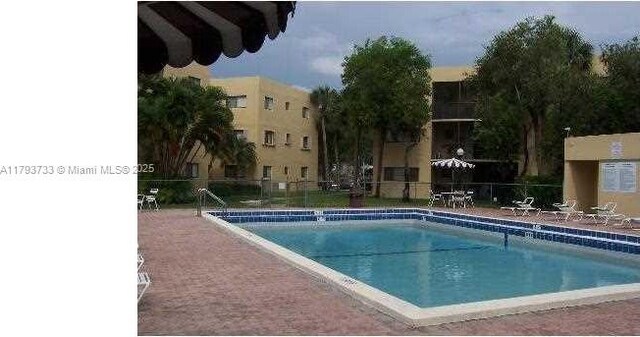 8005 SW 107th Ave Unit 118, Miami, FL 33173 - community pool featuring fence