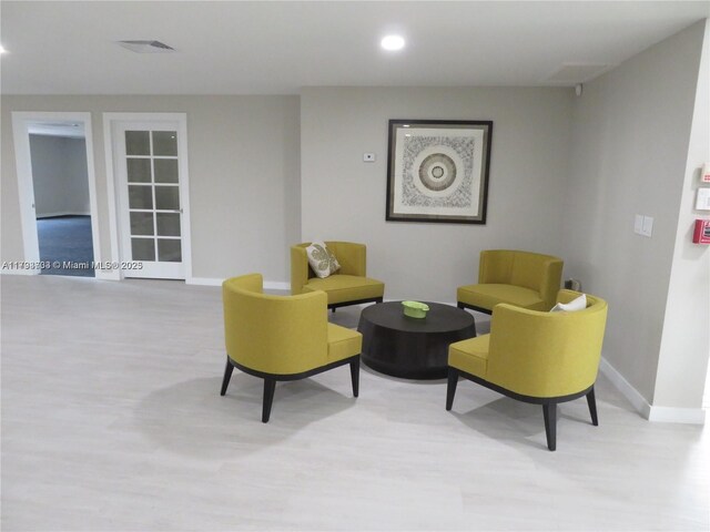 8005 SW 107th Ave Unit 118, Miami, FL 33173 - living area with recessed lighting, baseboards, visible vents, and light wood finished floors