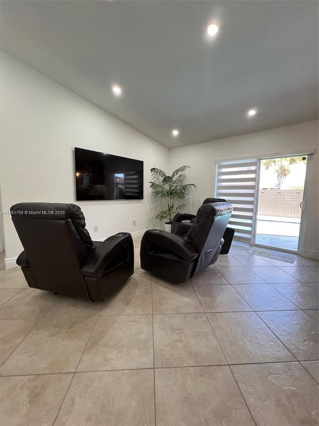 tiled living room with recessed lighting and lofted ceiling