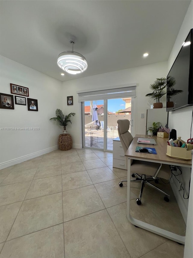 office space featuring baseboards, recessed lighting, and light tile patterned floors