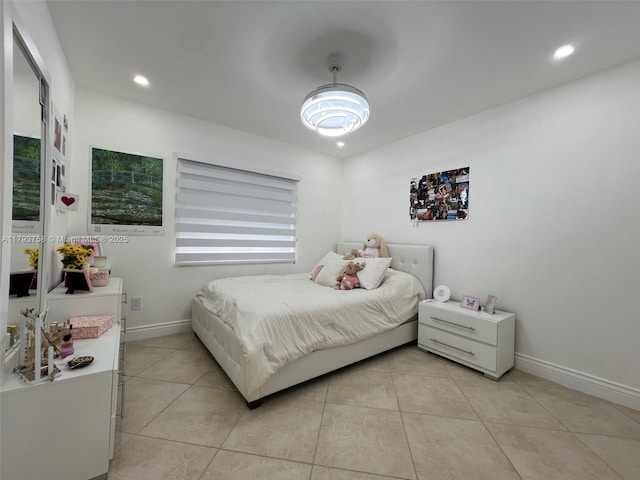 bedroom with recessed lighting, baseboards, and light tile patterned floors